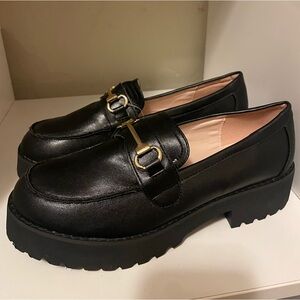 Black and gold buckle chunky loafers